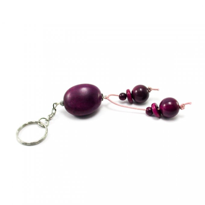bijoux de sac avec pendentif en noix de tagua et perles ivoire végétal violet pourpre