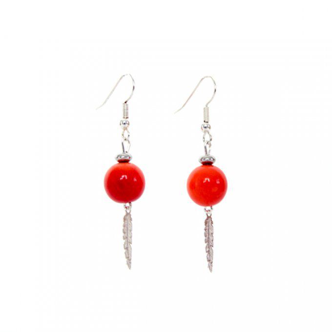 boucles d'oreilles chic avec perles oranges et plume argentée