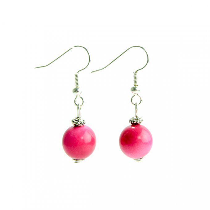 bijou d'oreilles original avec perles de tagua rose fuchsia