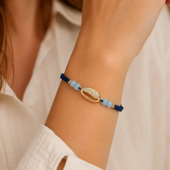 Bracelet Éternel Cauri tressé bleu & aigue-marine