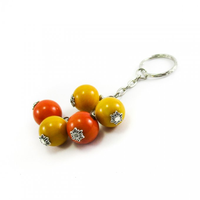 bijoux de sac avec perles d'ivoire végétal jaune orange