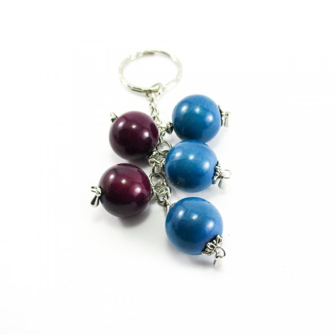 bijou de sac avec perles d'ivoire végétal bleu et pourpre