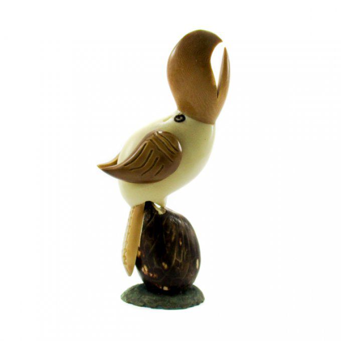 figurine toucan sculpté dans la noix de tagua