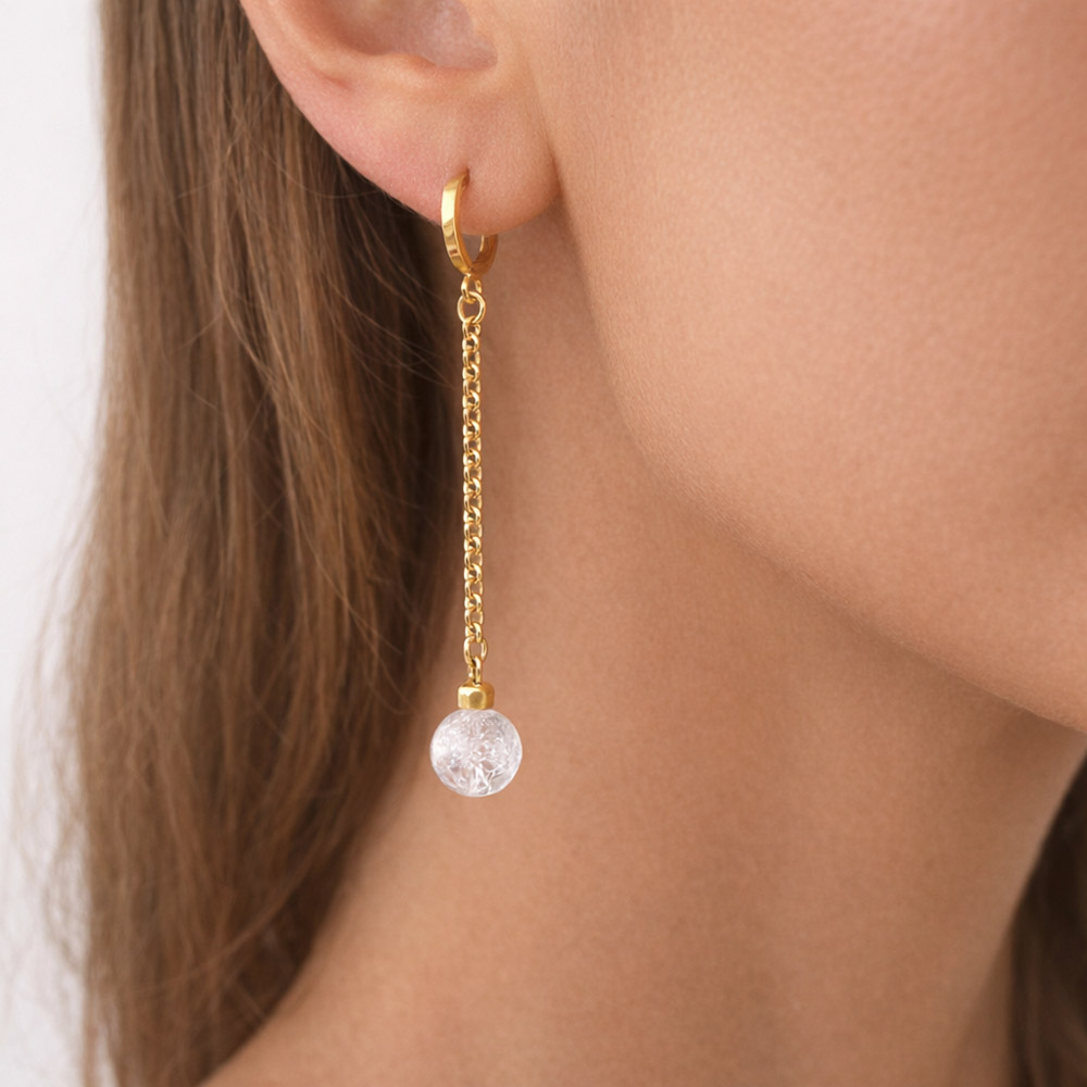 Boucles d'oreilles chic et élégante avec chaîne en or